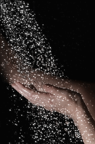 glitter falling into hands.gif