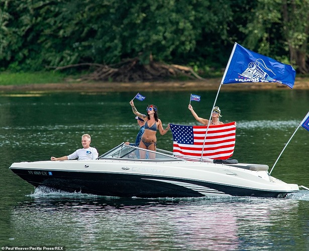 32905596-8708651-A_boat_takes_part_in_a_pro_Trump_boat_parade_on_the_West_Branch_-a-36_1599551520474.jpg