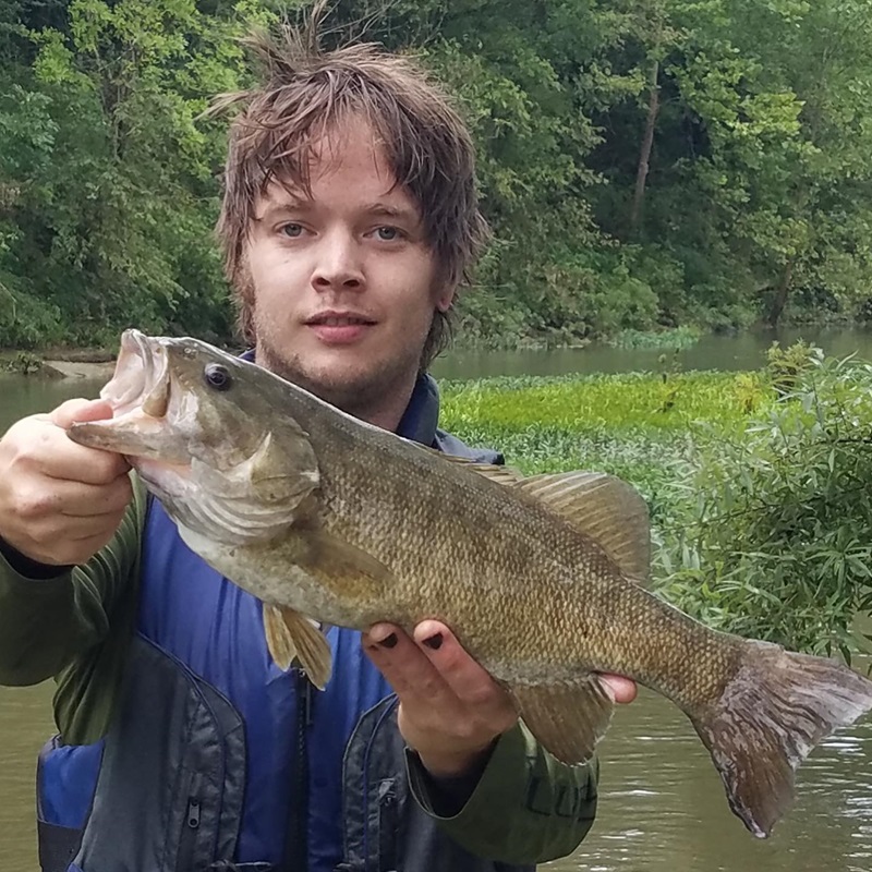 Billy Strings with bass fish 2.jpg