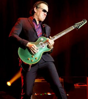 Joe-Bonamassa-Kicking-it-into-High-Gear-300x336.png