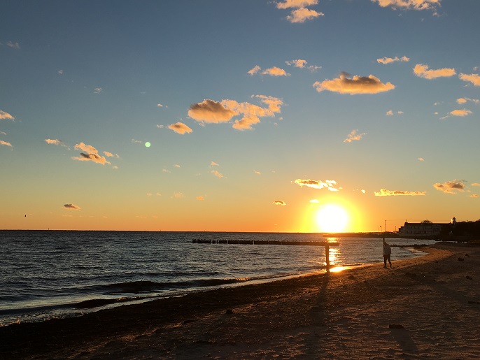 Sayville Beach Sunset 5 34pm man walking 11 3 2018.jpg