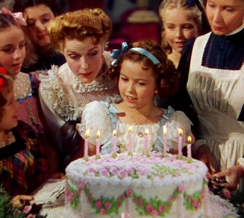 Shirley-Temple-The-Little-Princess-1939-film-cute-girl-born-23-April-1928-Shirley-Temple-Black-beautiful-American-movie-star-TV-television-actress-singer-dancer-curly-hair-birthday-cake-candles-girls-party-photo.jpg