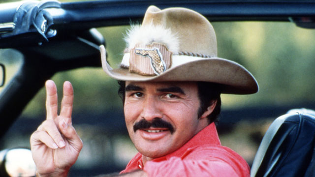 burt-reynolds-mustache-peace-sign.jpg